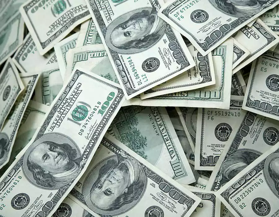 100_dollar_bills_pile