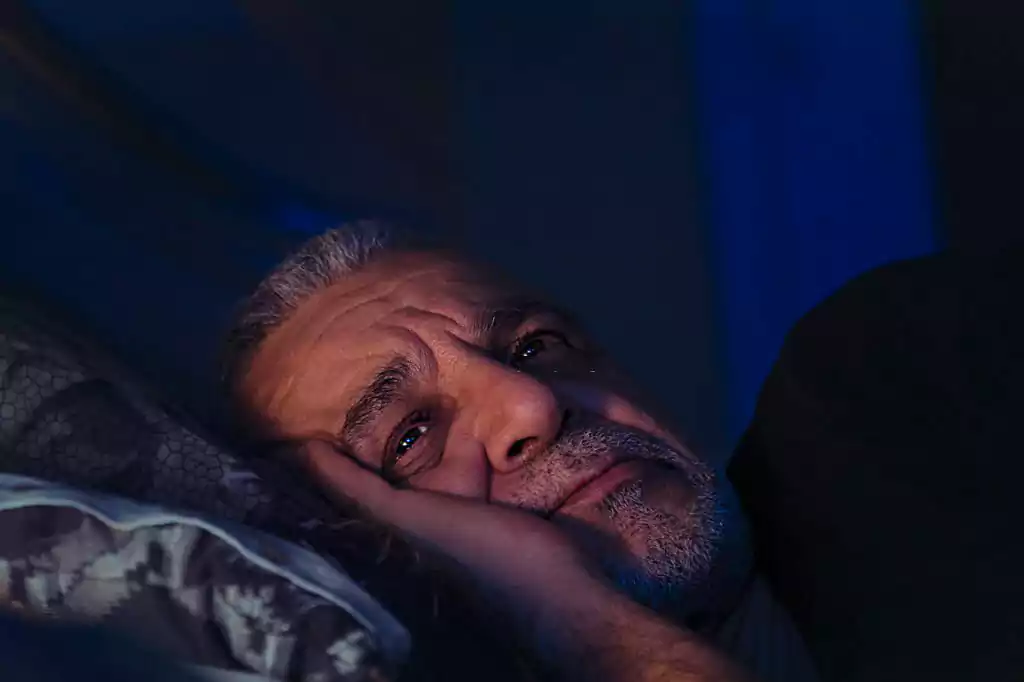 man_having_hard_time_sleeping